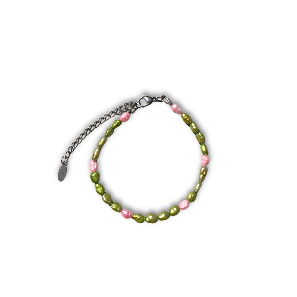 Pistachio Pearl bracelet worn on a wrist – Feminine Creatures