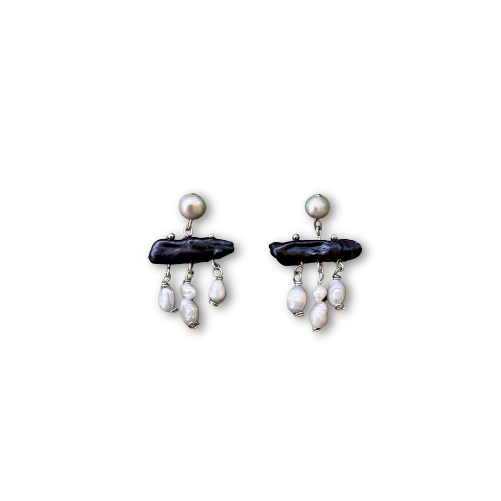 The Nyx earrings worn by a model – Feminine Creatures