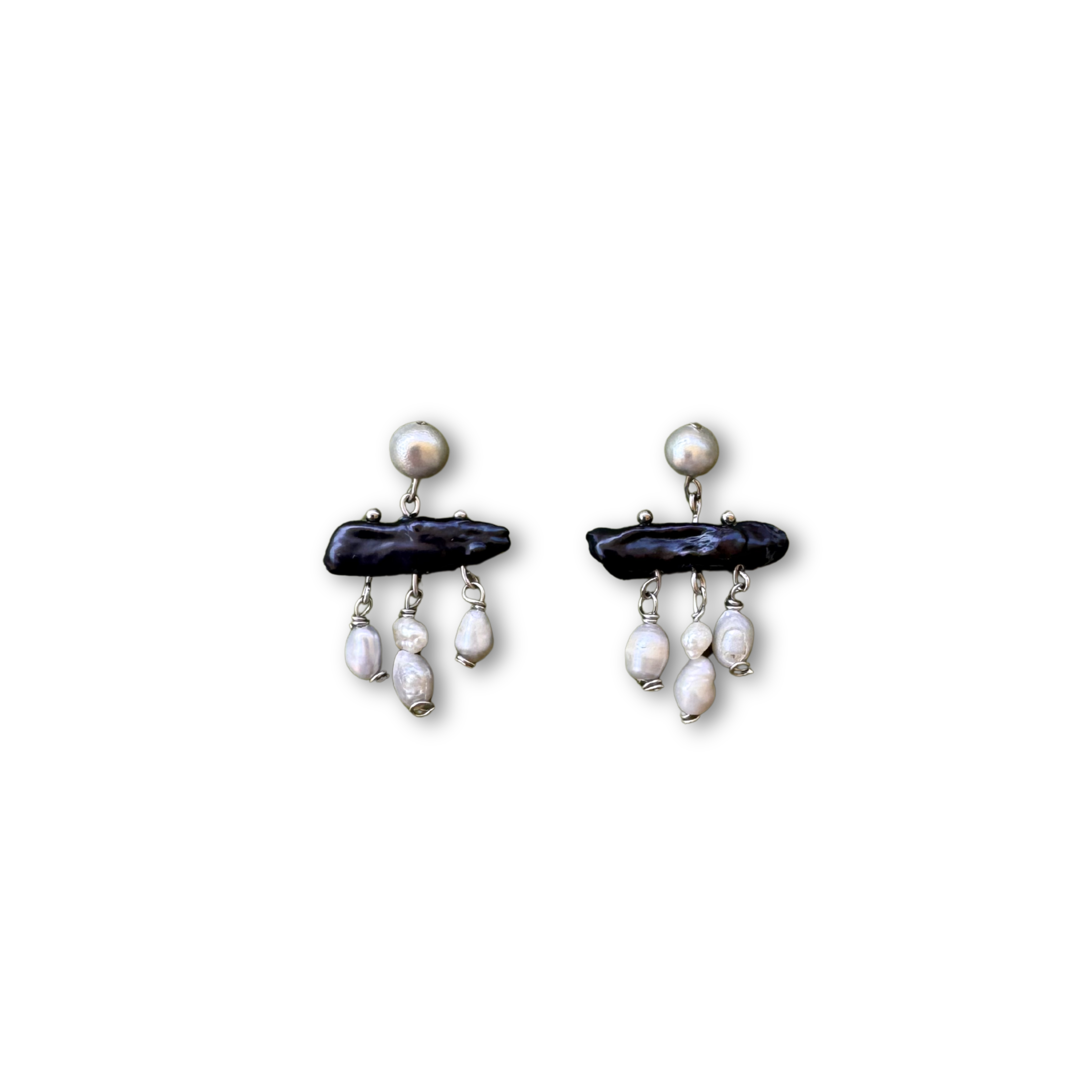 The Nyx earrings worn by a model – Feminine Creatures