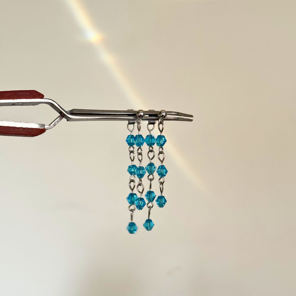Waterfall earrings with cascading blue crystals – Feminine Creatures