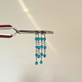 Waterfall earrings with cascading blue crystals – Feminine Creatures